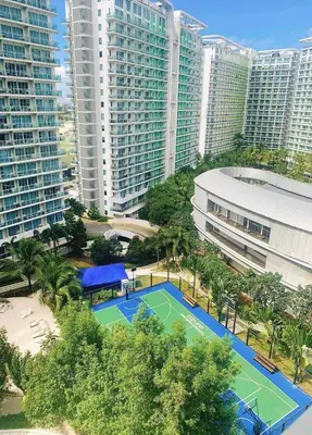 an aerial view of a tennis court in a city at Budget Suite Paranaque in Manila