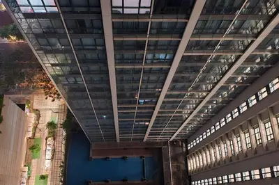 a large building with a lot of windows at City Life Suite Uptown BGC in Manila