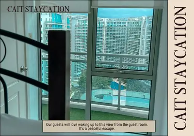 a view of a city from a window in a building at Azure Parañaque - 2br Beach View 18th Floor in Manila