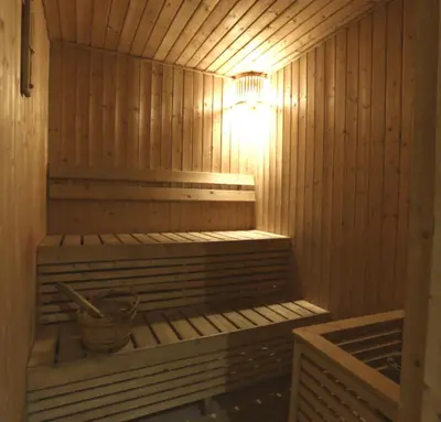a sauna with a light on the inside of it at Luxury Apartment with PA, Skyline View & Top Amenities in Manila