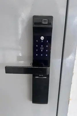 a remote control on the side of a refrigerator at Origin Studios - Walk to Highstreet, BGC in Manila