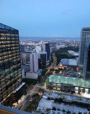 an aerial view of a city with tall buildings at Uptown Parksuites Tower 2 BGC - Staycations Up Above 9 in Manila