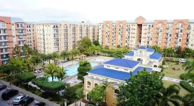 an aerial view of a large building in a city at Casa Luz Budget Condotel in Manila