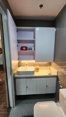 a bathroom with a sink and a toilet at Air residence Fantasy Sophisticated Chic Family living 300 Mbps Fast in Manila