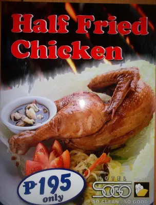 a plate of food with a chicken on top of noodles at Hotel Sogo - EDSA, Pasay Harrison in Manila