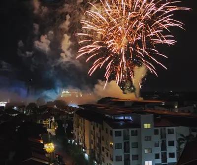 a firework display in a city at night at Calm House near Enchanted Kingdom Sta Rosa with Free Parking, Wifi, Netflix in Santa Rosa