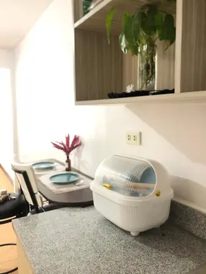 a hair dryer sitting on a counter in a kitchen at Simple Living in Anabu Primero