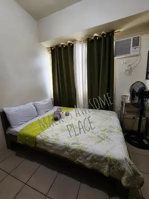 a bed with the words race written on it at Macks Awesome 12 Place Fast Wifi Netflix in Manila