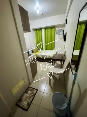 a view of a bathroom with green curtains and a toilet at Macks Awesome 07 Fast Wifi Premium Netflix in Manila