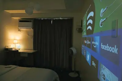 a room with a bed and a sign on the wall at NEW! Studio Condo in Prisma Residences Pasig in Manila