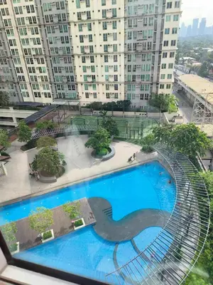 a view of a swimming pool on top of a building at Marty's Turf at San Lorenzo in Manila