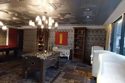 a room with a table with chessetts on it at Amazing 1 bedroom with pool, gym and stunning view at heart of Makati in Manila