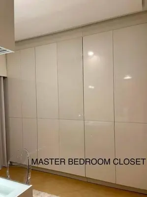 a white wall with the words master bedroom closet at 3BR Elegant & Central Loc- Netflix, WiFi, MiniBar! in Manila