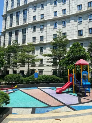 a playground with a slide in front of a building at Cluster 2, 81 Newport Blvd Near NAIA T3 in Manila