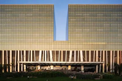 a large office building with a large building at City of Dreams - Nobu Hotel Manila in Manila