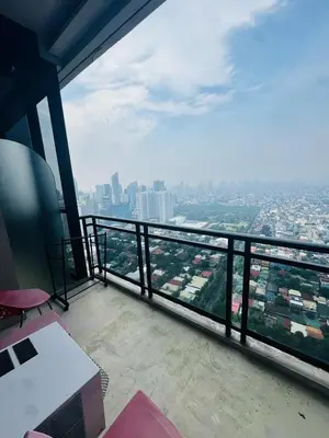a view of a city from the top of a building at Gramercy Residences Studio with balcony Near Airport in Manila