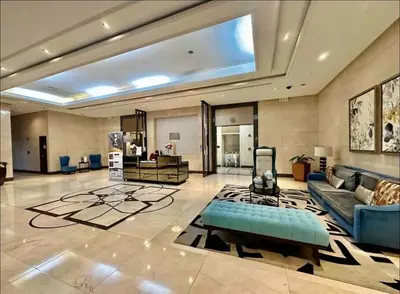 a large living room with a couch and a table at Cozy home Near NAIA & BGC in Manila