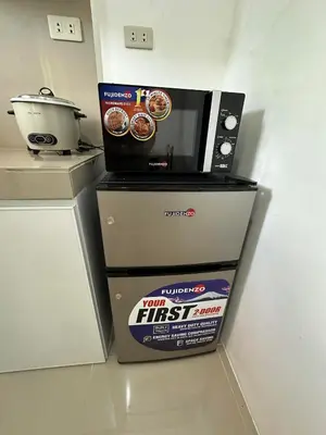a box of first seasoning sitting on top of a microwave at B&CH RESIDENCE Transient in Calamba