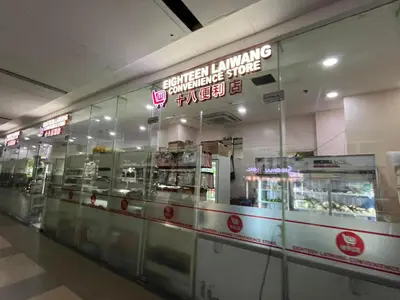 a grocery store with a display window in a mall at Shore 2 2-Bed Balcony City View WiFi Netflix near MOA 834 in Manila