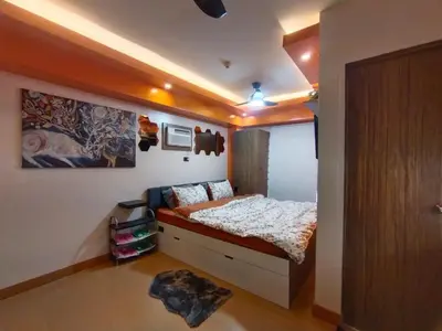 a bedroom with a bed in a room at Near Manila Airport, COZY Hotel Style Studio Condo 5G in Manila