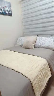 two beds sitting next to each other in a bedroom at Cozy Staycation at Destiny's Crib Fame, Edsa Mandaluyong in Manila