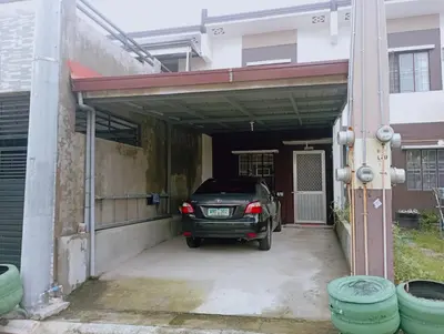a car is parked inside of a garage at JeSa's Serenity Sanctuary in Dasmariñas