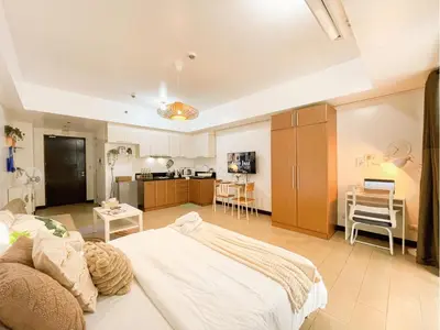 a large room with a bed and a kitchen at BGC Luxury, Venice Grand Canal Mall #vlrtc27c in Manila