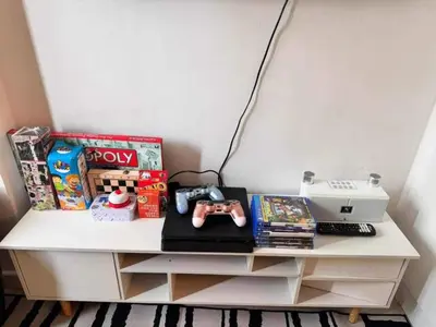 a white desk with a camera on top of it at A2Z Staycation at Azure Urban Residences in Manila