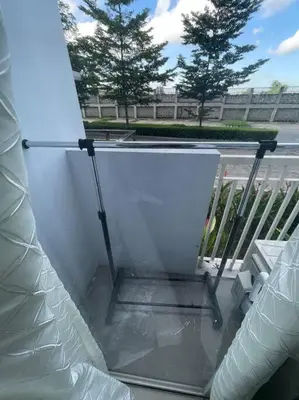 an outside view of a balcony with a glass floor at Modern & Cozy Space near NAIA Terminal 1 in Manila