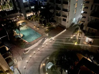 an overhead view of a building with a swimming pool at 5Q Place Hotel Manila Airport in Manila