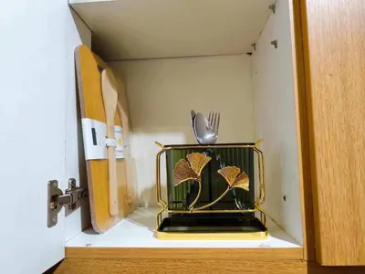 a vase with a fork in it in a room at Mall of Asia Garden view 2 Bedrooms 2 bathrooms in Manila