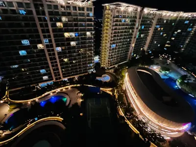 an aerial view of a city at night at Spacious 1Bedroom Condotel Resort in Manila