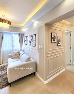 a bedroom with a bed in a room with a window at Luxe 3BR unit in the heart of BGC Taguig in Manila