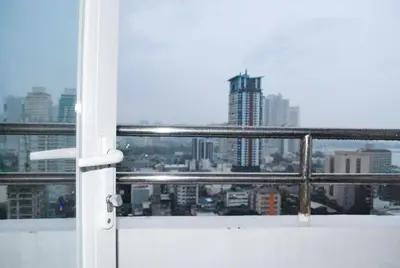 a view of a city skyline from a window at Brianna's haven property rental in Manila