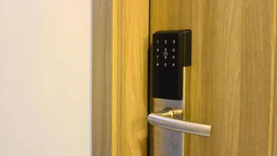 a close up of a glass door with a handle at SMDC Coast Residences in Manila