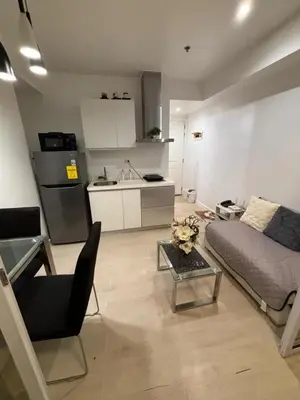 a living room with a couch and a table at Azure Urban Resort Residences in Manila