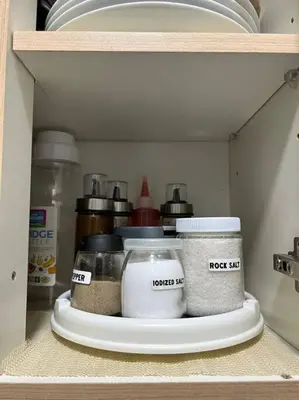 a shelf of a refrigerator filled with food items at 1BR Calathea Place nr Airport, Netflix,50mbps Wifi in Manila