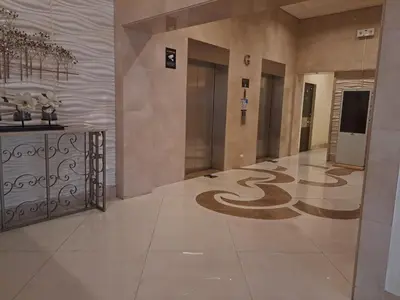 a lobby with a snake on the floor of a building at 1 Bedroom unit near NAIA T3 in Manila