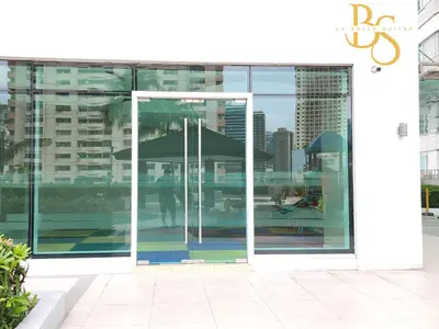 an open door with an umbrella in a building at The Beacon Makati New Renovated Studio Ayala Greenbelt CBD Makati PH in Manila