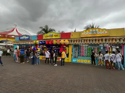 a group of people standing in front of a store at Shore Family Suite 2 beds for 4 pax TV Netflix WiFi Near MOA NAIA 9116 in Manila