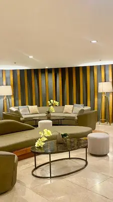 a living room with couches and a coffee table at CASA ROSITA Staycation by 3MR in Manila