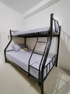 a couple of bunk beds in a room at Shore Residences Tower D - 2 Bunkbed Ideal for 6 guests in Manila