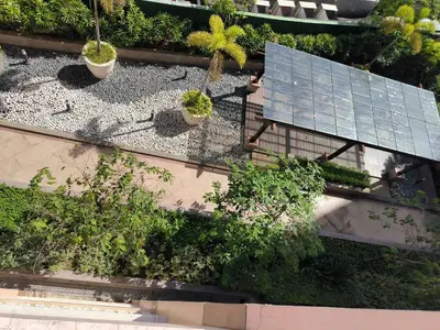 an overhead view of a bench and plants at Studio Type Condotel at Venice McKinley Taguig City in Manila