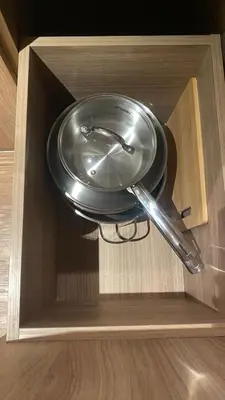 a metal plate in a wooden box in a drawer at The Metro Zen at Hotel Residences Acqua - Novotel Tower in Manila
