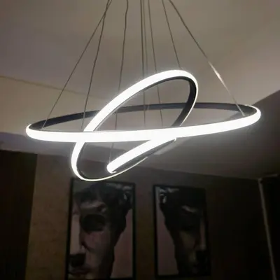 a white light fixture hanging from a ceiling at Gabila Staycation at Azure in Manila