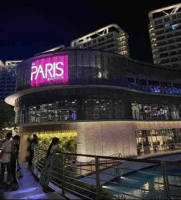 a building with a pink sign on the side of it at Azure Urban Residences Bahamas & One bedroom in Manila