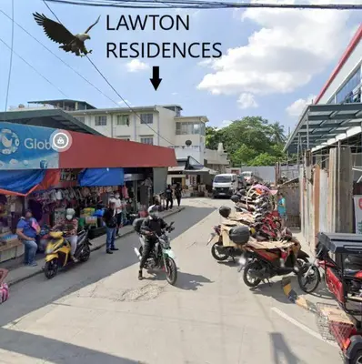 a group of motorcycles parked on a city street at Lawton Residences Studio Room 3E in Manila