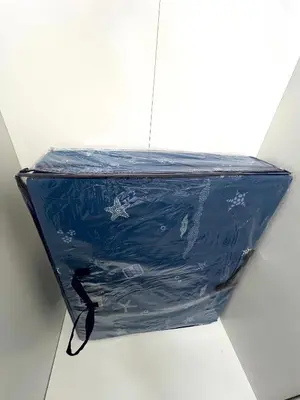 a blue plastic container sitting on top of a table at Sofias Haven - Shore 3 Residences T1 in Manila