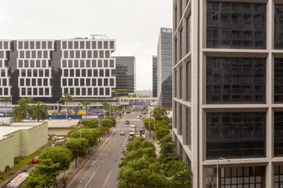 a view of a city street with tall buildings at Shore Residences Tower D - Two Bedroom with Balcony in Manila