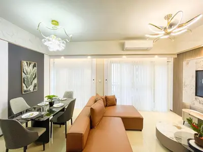 a living room with a couch and a dining room at Modern Luxury 4BR Manila Bay beside Okada Manila in Manila